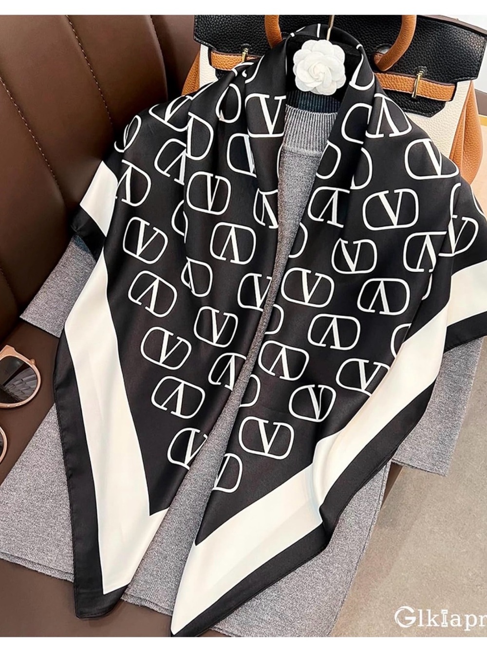 Black & White Logo Silk Scarf Accent

Not THE REAL DEAL